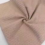 Woven Houndstooth Jacquard Chenille Upholstery Fabric gathered sample showing drape