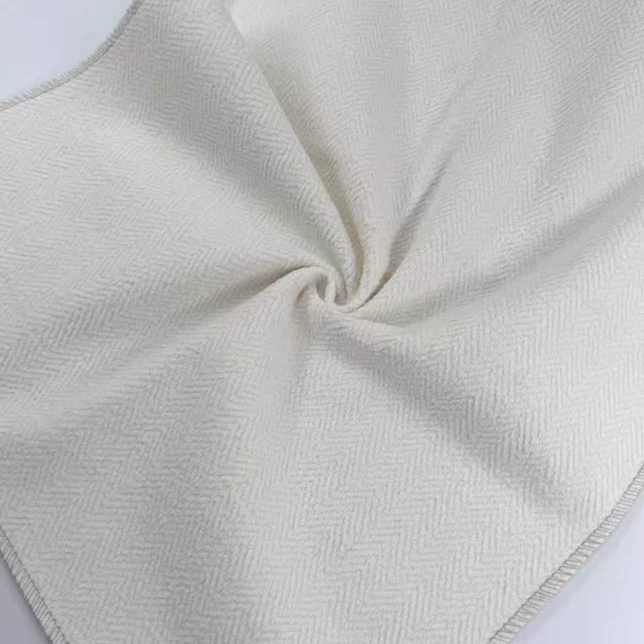 Woven Herringbone Jacquard Chenille Upholstery Fabric gathered sample showing drape