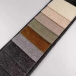 Woven Teddy Chenille Upholstery Fabric color swatch card at an angle