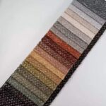 Woven Two-tone Chenille Snowflake Textured Upholstery Fabric color swatch card at an angle