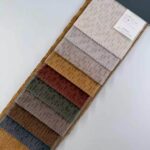 Woven Viscose Blended Corn Grain Velvet Upholstery Fabric color swatch card at an angle